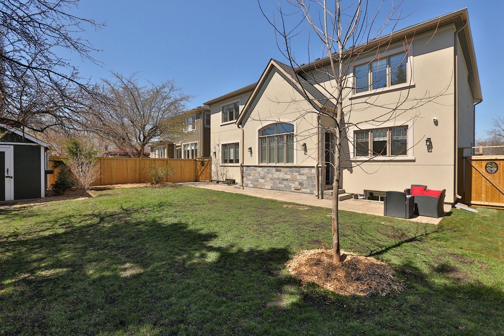 A large house with a large lawn in front of it