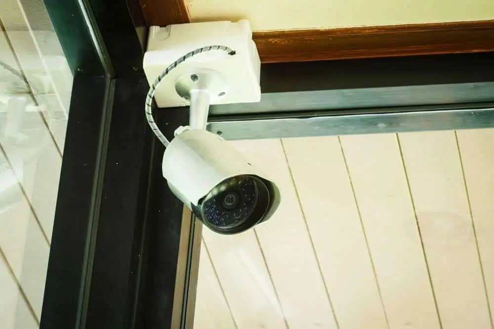 Security Camera, White, Mounted on The Ceiling, Angled Towards the Viewer — Pacific Telephone & Data In Cardiff, NSW