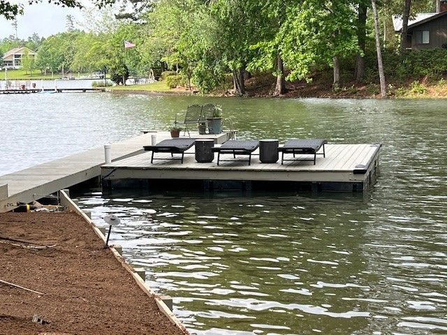 A wooden dock is in the middle of a lake