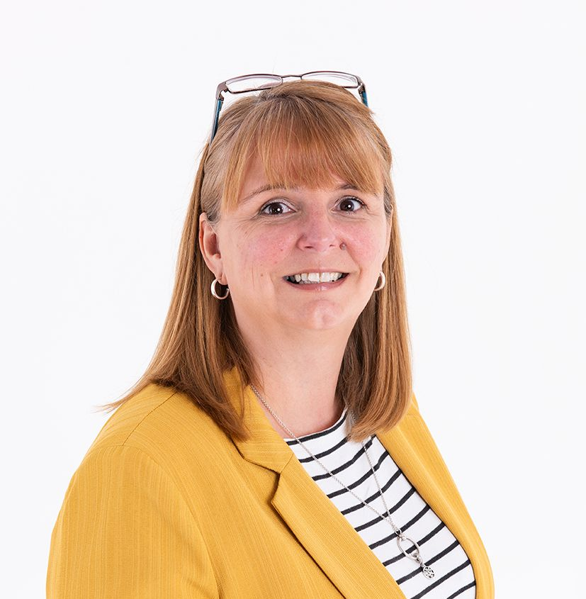 woman in yellow jacket