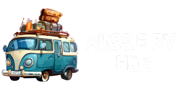 Blue and cream vintage van with luggage on the roof, ready for a road trip.