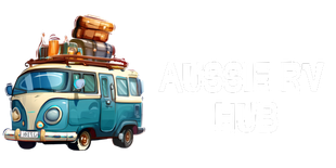 Blue and cream vintage van with luggage on the roof, ready for a road trip.