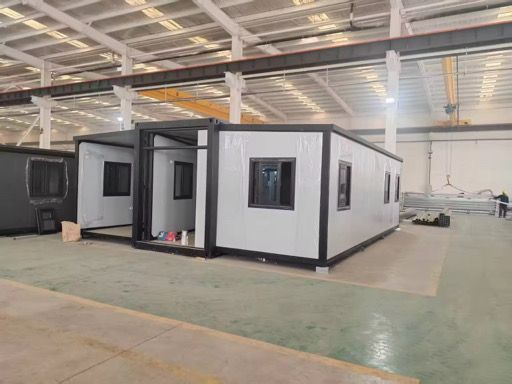 A large warehouse with a lot of containers in it.