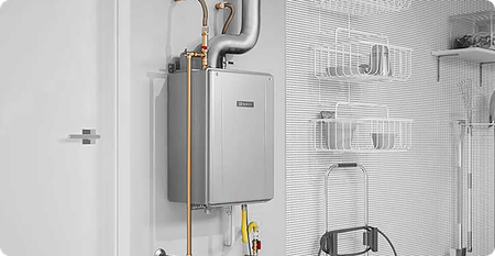 Two water heaters are being installed in a basement.