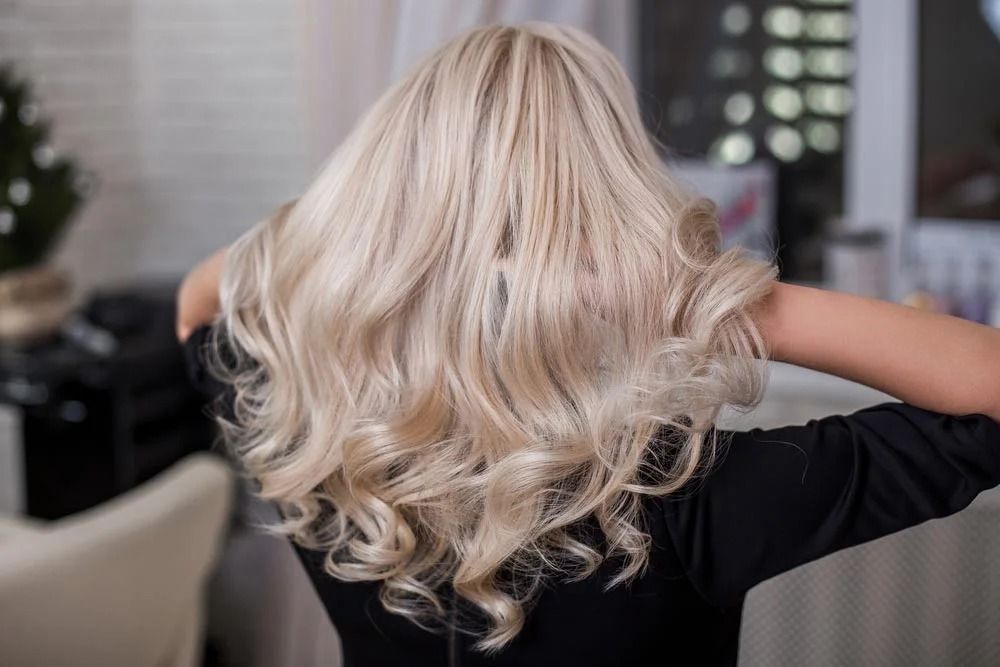 Blonde Hair Styled in Loose Waves, Viewed From the Back — Oh So Blonde Hair Studio in Buddina, QLD