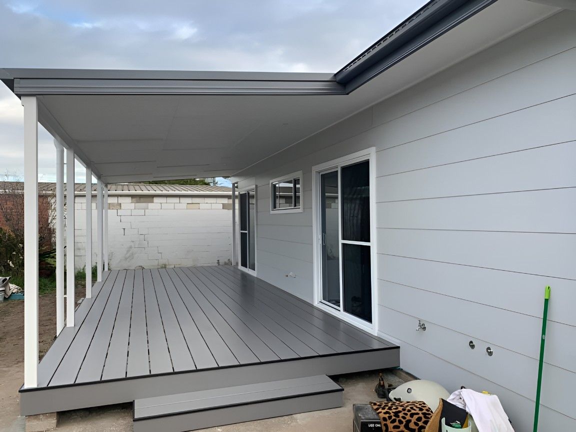 A White House With a Covered Porch and a Wooden Deck — Let's Paint & Decorate Pty Ltd in Oak Flats, NSW