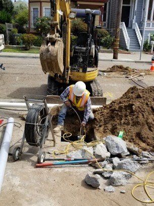 Plumber Near Me — Worker in Sewer Cleaning in Richmond, CA