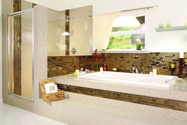 modern bathroom with mosaic tiling and granite counters