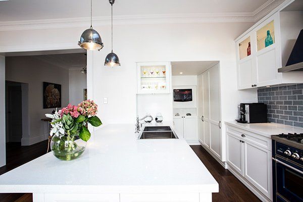 kitchen with countertop and flowers on counter