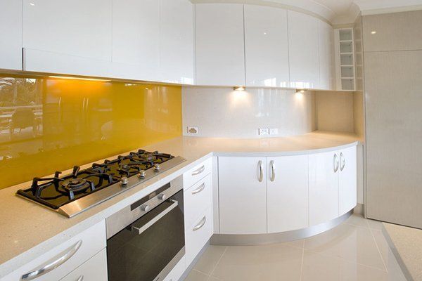 kitchen with granite countertop and yellow accents