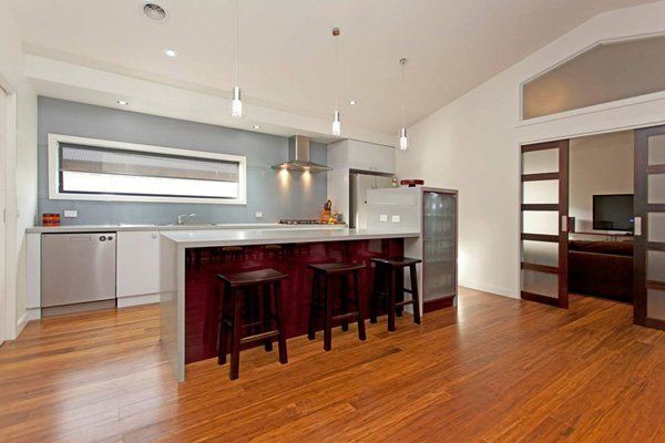 kitchen with wood floors and granite countertops
