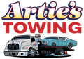 Artie's Towing logo featuring a tow truck hauling a teal car. The name is above in white and yellow text.