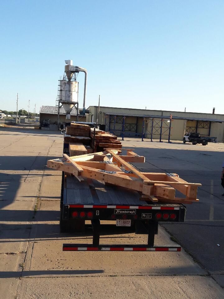 a timber truss under construction