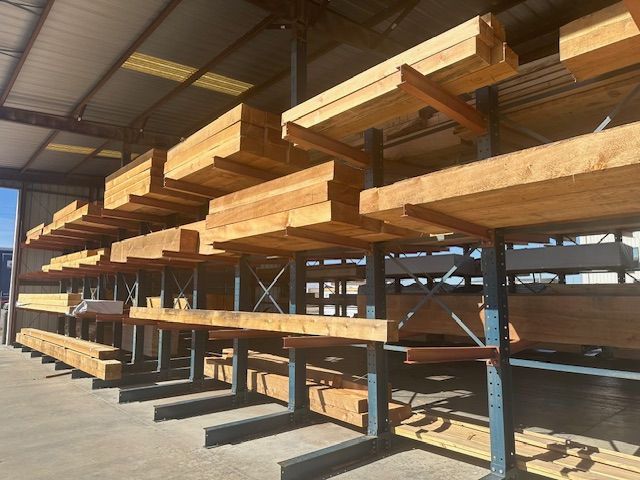 a warehouse filled with heavy timbers