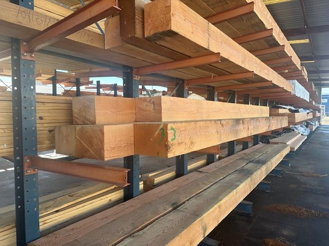 a warehouse filled with heavy timbers