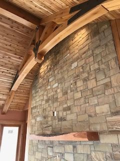 decorative wood trusses in a wooden ceiling