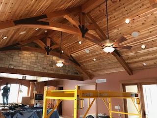 decorative wood trusses in a wooden ceiling
