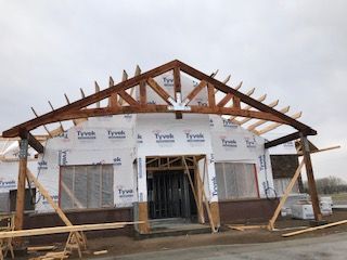 a timber truss under construction