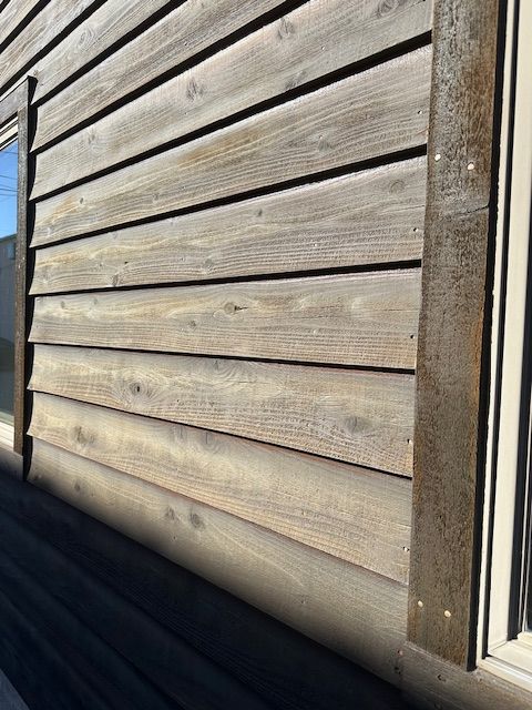 a wall covered in tongue and groove wood paneling