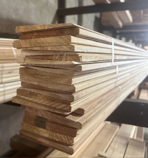 a stack of wood siding