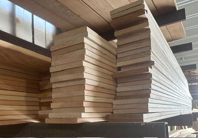 a stack of varous sizes of plywood