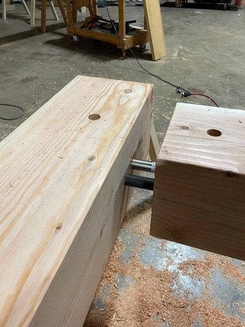 a timber truss under construction