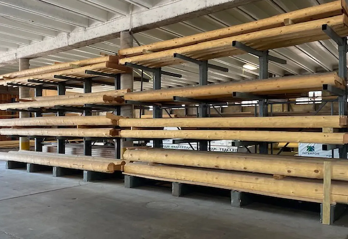 a lumber rack of logs