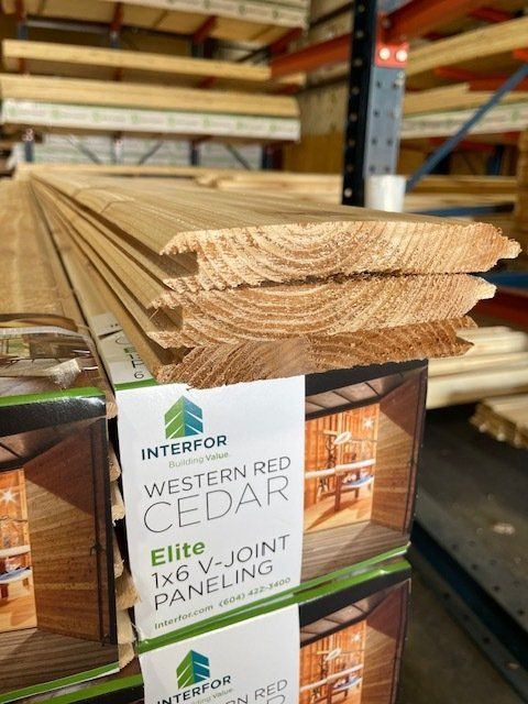 a stack of tongue and groove cedar siding