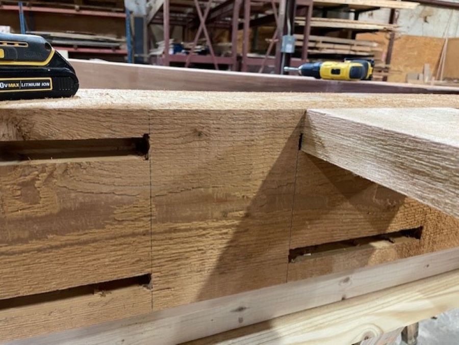 a timber truss under construction