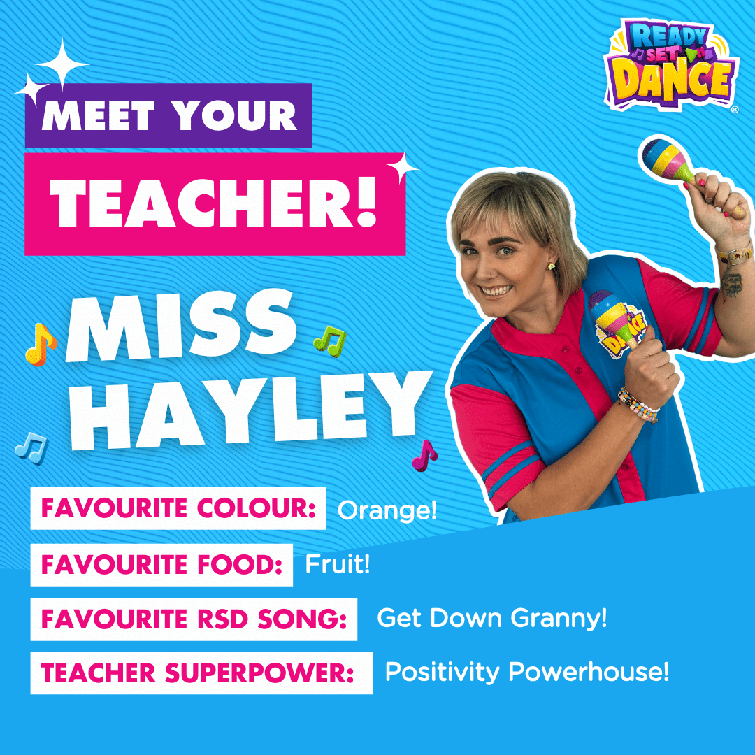 A Woman In A Blue And Pink Jersey Is Holding A Colorful Maraca — Dance Express Mackay In North Mackay, QLD