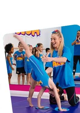 A Group of Children Wearing Blue Tank Tops With the Word Dance on Them — Dance Express Mackay In North Mackay, QLD