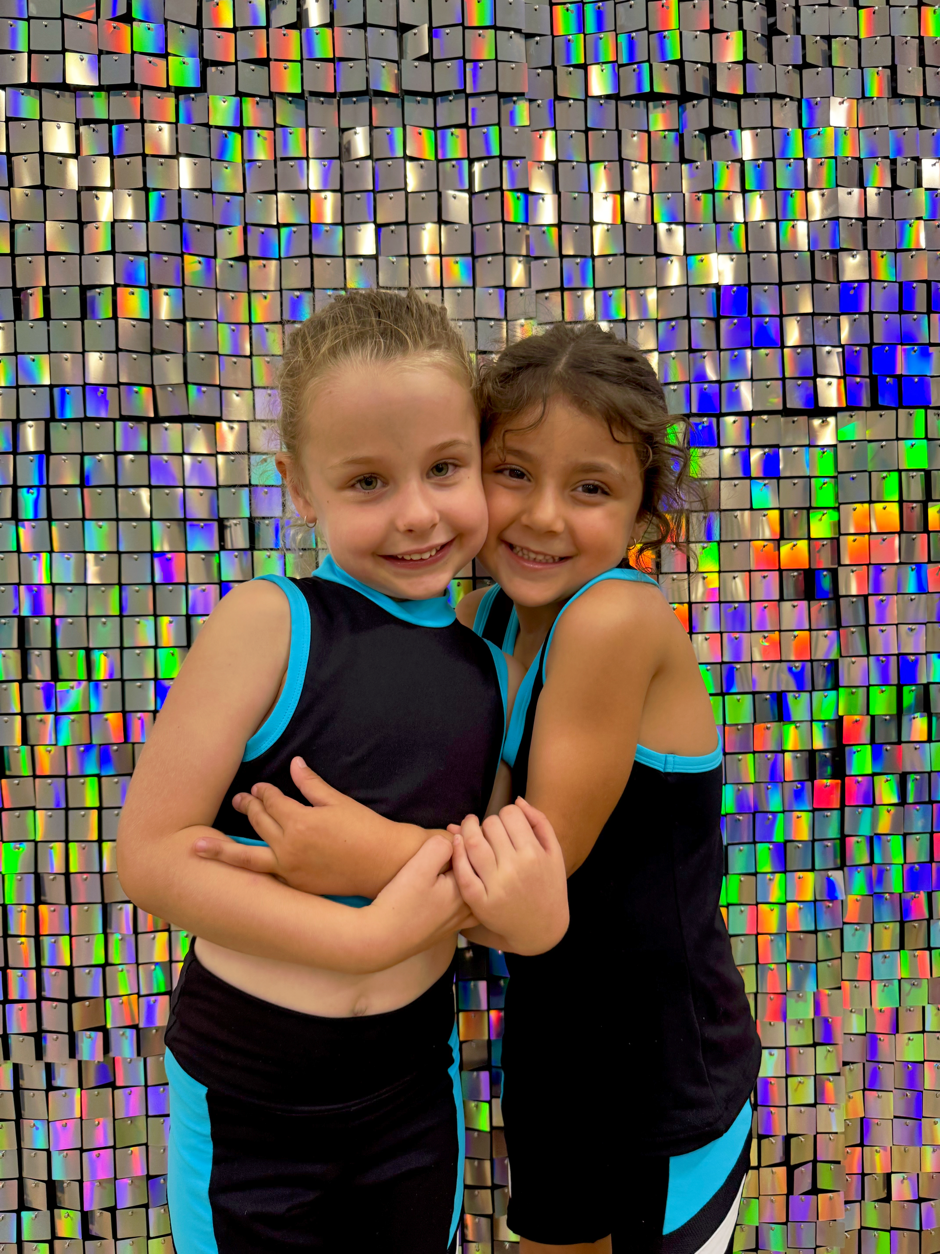 A Group Of Children Are Sitting On Chairs In A Room — Dance Express Mackay In North Mackay, QLD