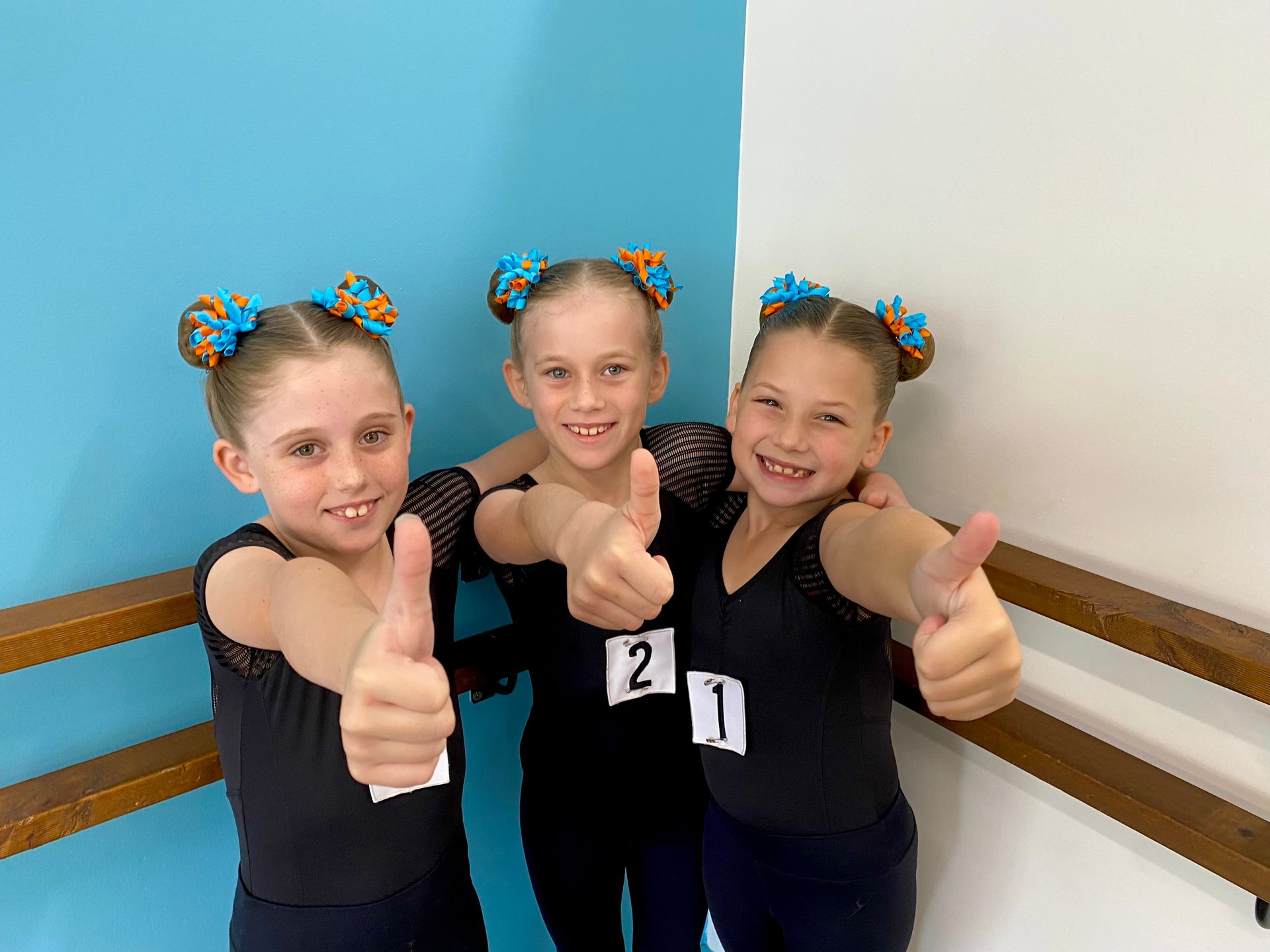 Two Little Girls Posing For A Picture With One Wearing A Shirt That Says 20 — Dance Express Mackay In North Mackay, QLD