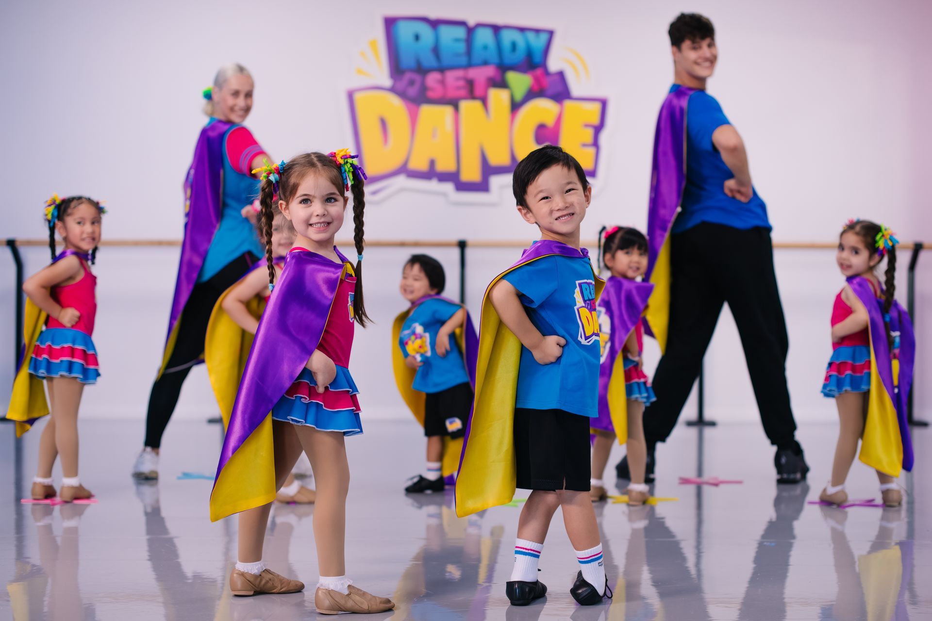 A Group Of Young Girls Wearing Black Shirts With The Number 20 On Them — Dance Express Mackay In North Mackay, QLD