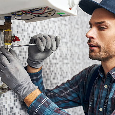 Plumber Fixing Sink Pipes — Battle Creek, MI — Roto Rooter