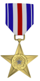 A golden star medal with a blue, white, and red striped ribbon.
