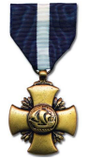Gold medal with cross design and blue and white ribbon.