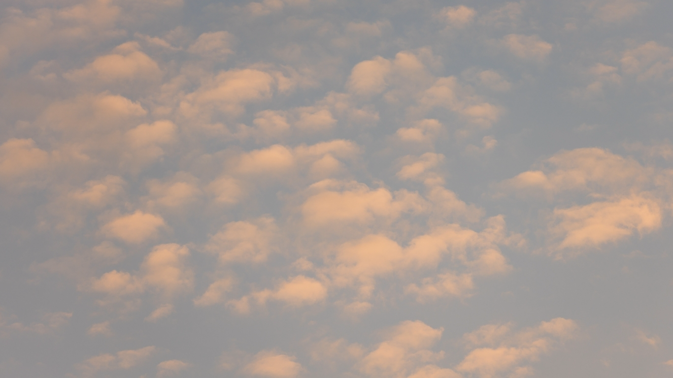 yellow clouds with a blue sky
