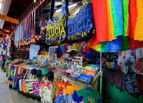 A colorful market with a bag that says lucia on it