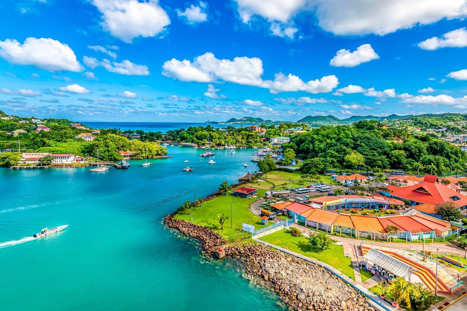 An aerial view of a small island in the middle of a body of water.