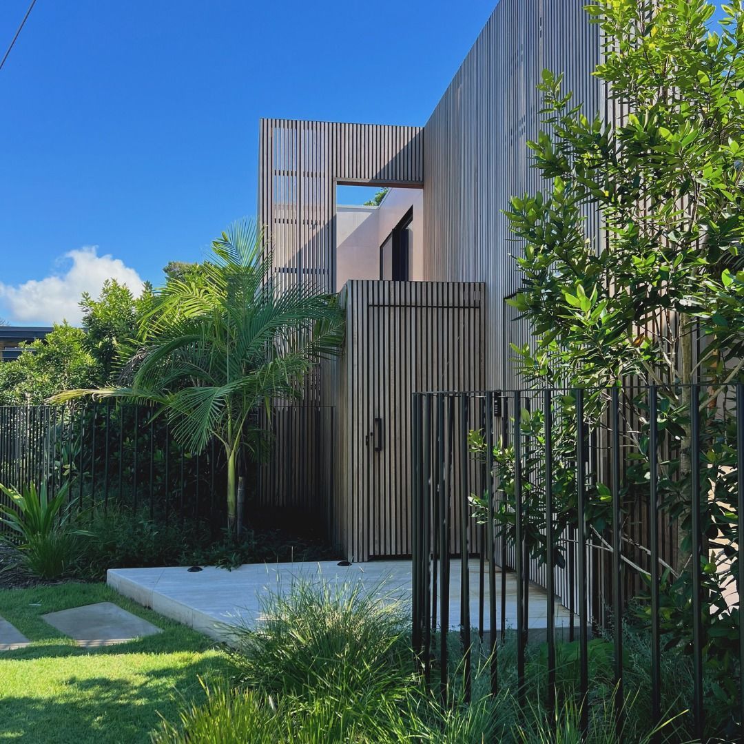 Modern House with Wooden Facade and Vertical Slats — Byron & Beyond Fencing in Billinudgel, NSW