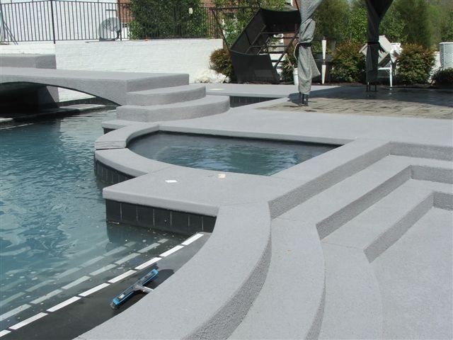 Modern Swimming Pool With Stairs — Jamestown, NC — Decorative Concrete Unlimited Inc