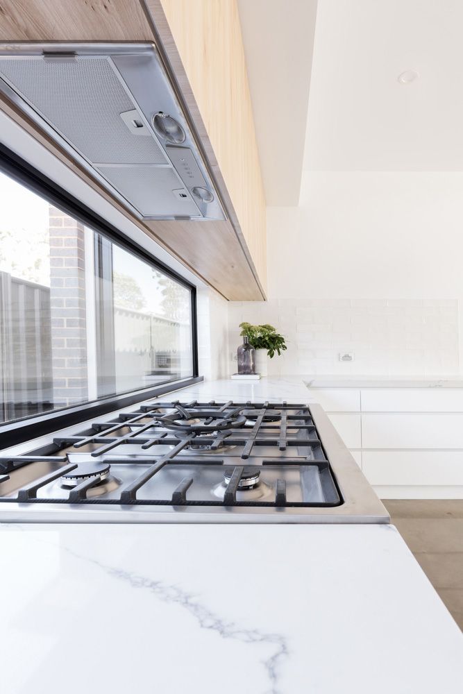 Side Left Kitchen With Splashback — Glass Repairs & Installations in Scone, NSW