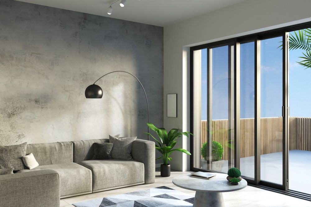 A Cosy Living Room With Sliding Windows