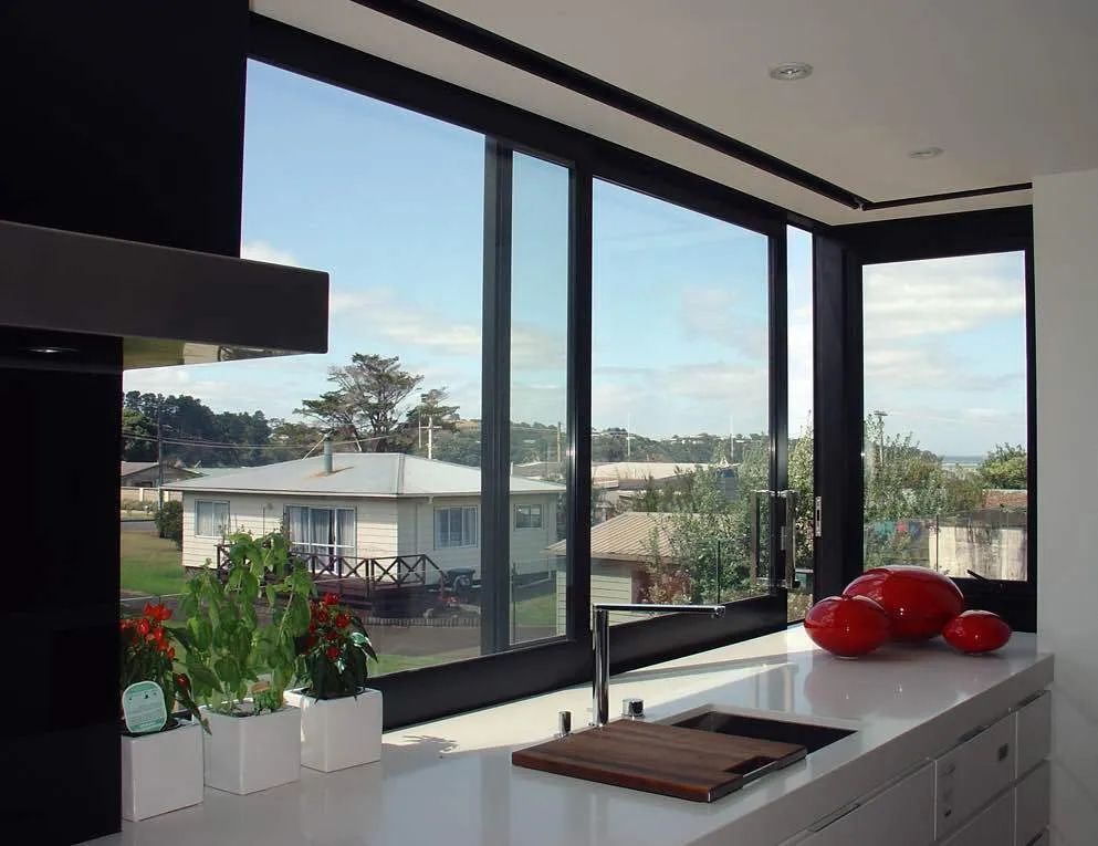 Kitchen With A Sliding Window — Windows & Doors in Taminda, NSW