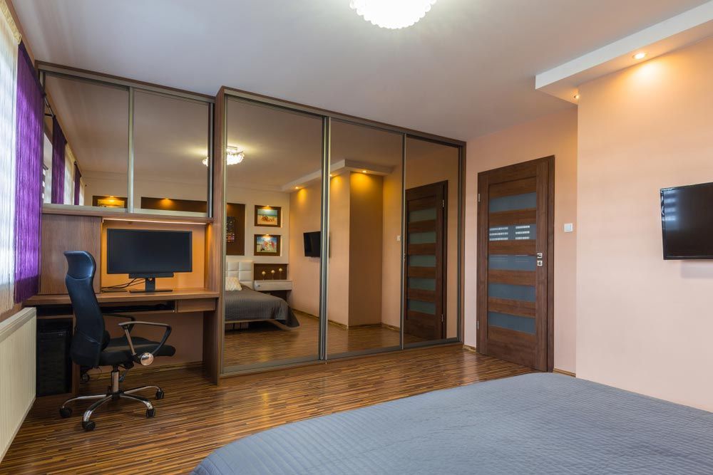 Wardrobe With Mirrors On A Bedroom