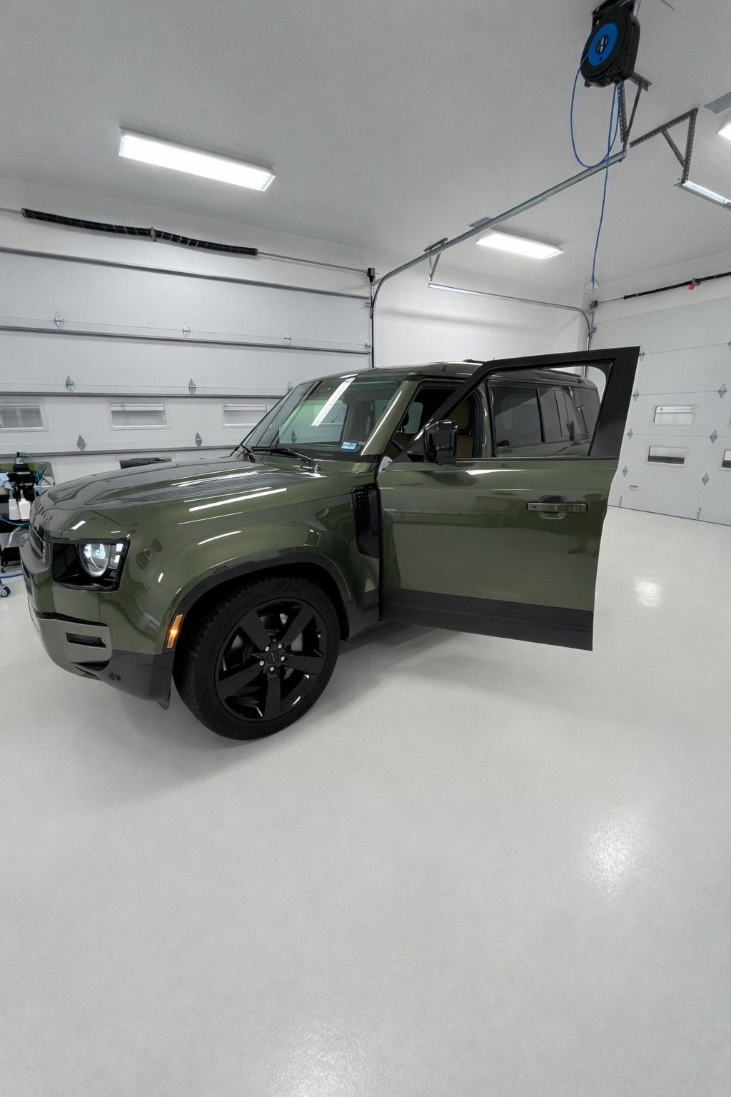 The final results after applying XPEL XR PLUS Ceramic Window Tint to the two front doors (30% VLT) and the windshield (70% VLT) in our dedicated clean film room at BLUE OCEAN AUTO SPA in Cedar Park, TX