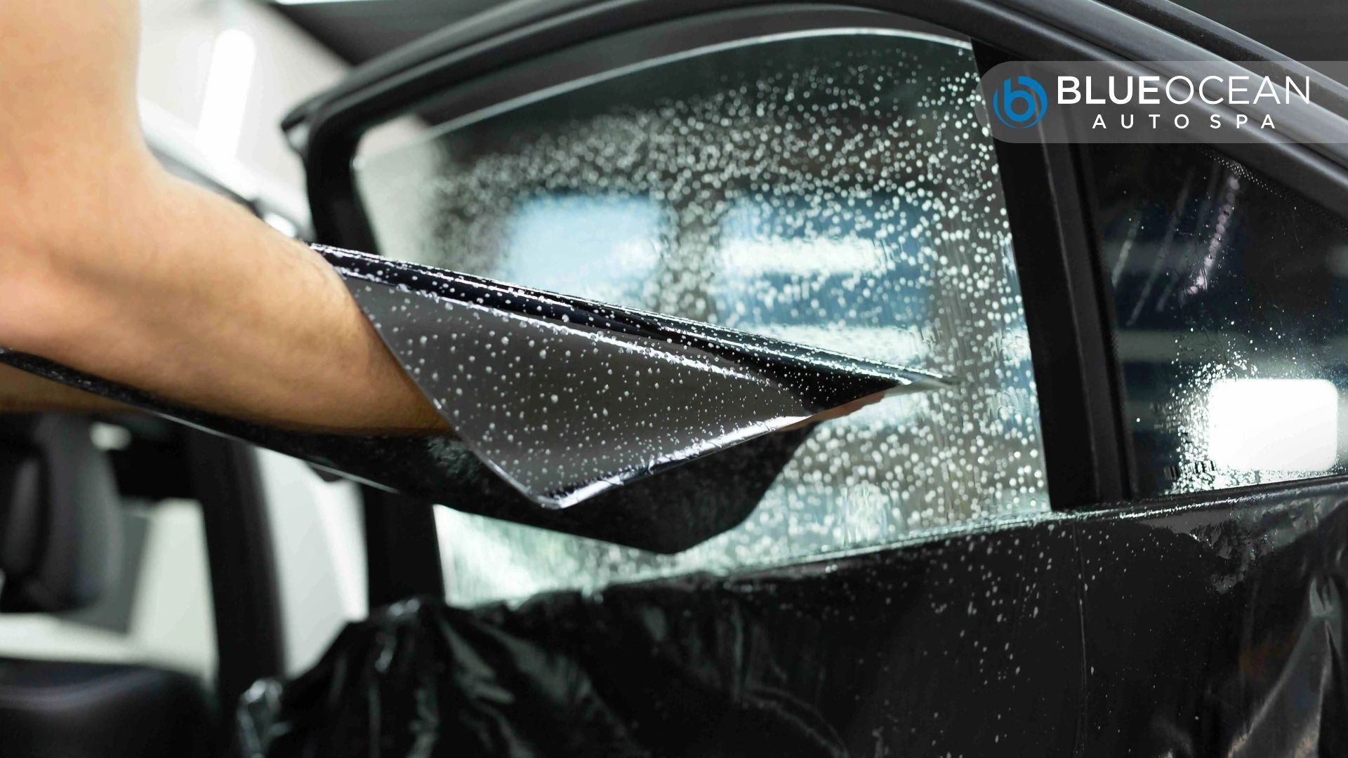 Comparison image of a white car with tinted windows displayed in sections from 20% to 90% tint level