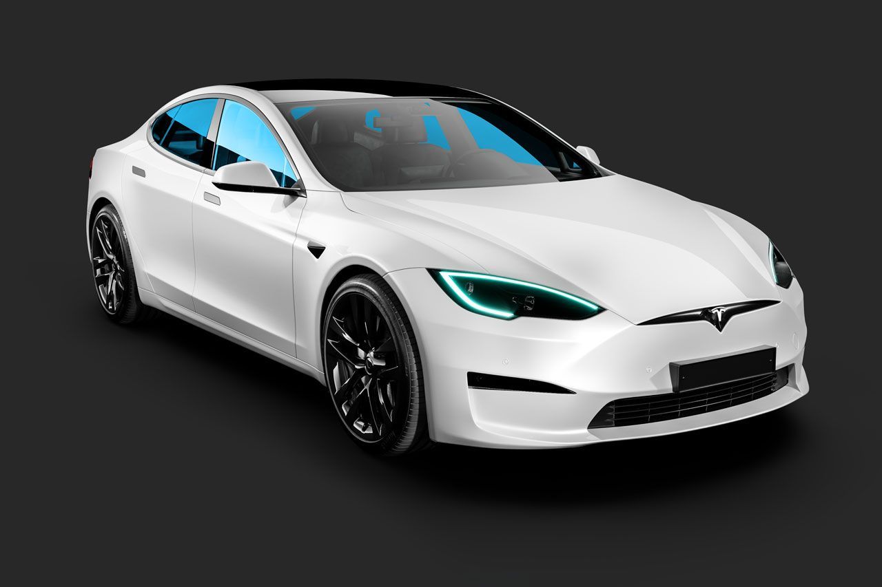 A white tesla model s with blue lights on a black background.