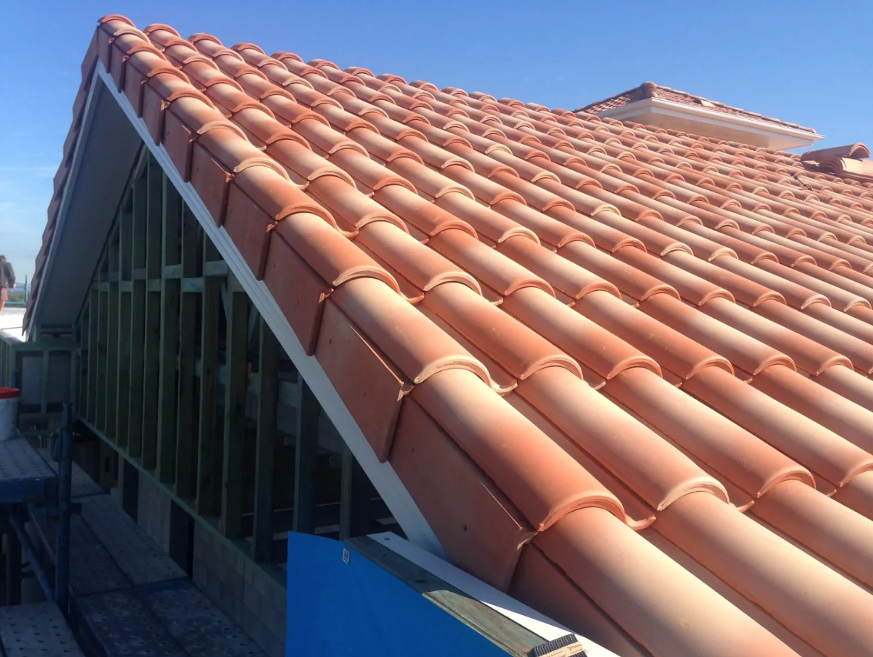 A Roof With a Lot of Tiles on It — Mr Roof Tiles in Lismore, NSW